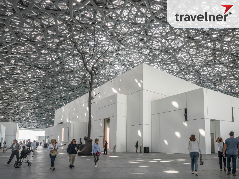 Louvre Museum attracts travelers with its unique architecture.